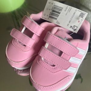 Pink and white adidas